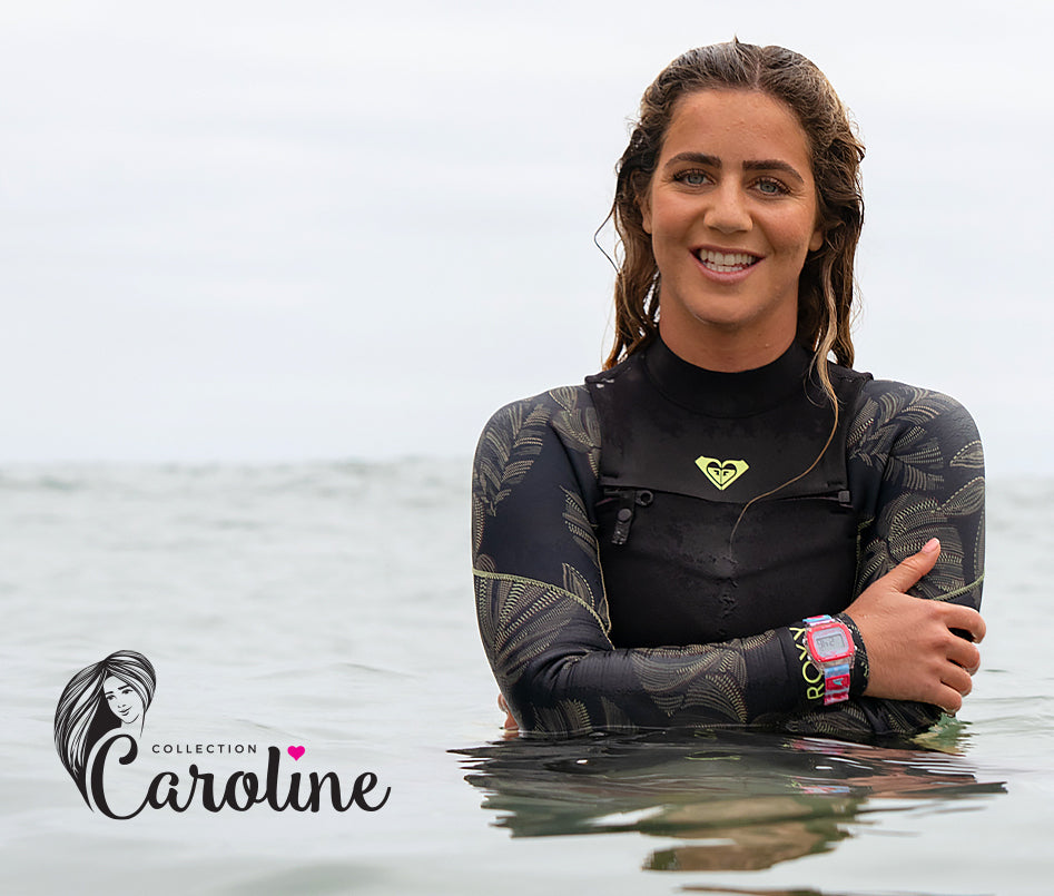 Caroline Marks in a wetsuit, showcasing the Freestyle collection with a watch on her wrist.